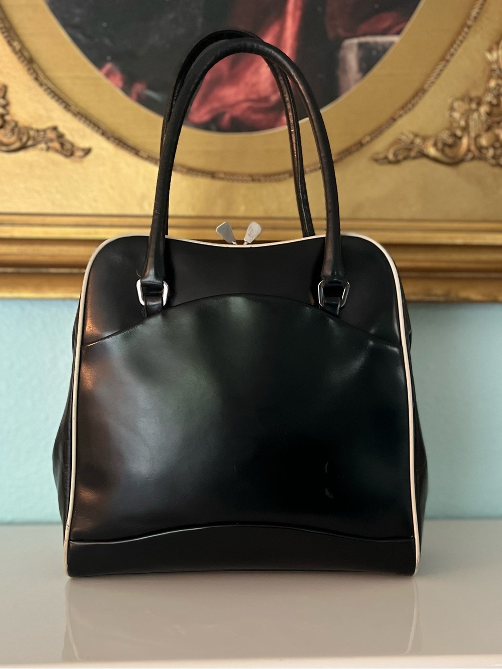 Prada Vitello Frame black bag with kiss lock closure.  With wallet. COA -2000